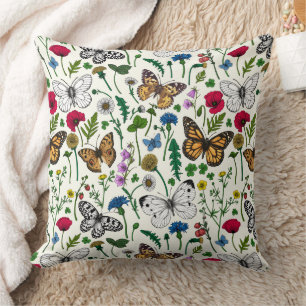 Wild flowers and butterflies on white throw pillow