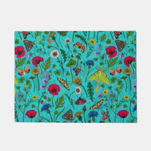 Wild flowers and moths on teal doormat