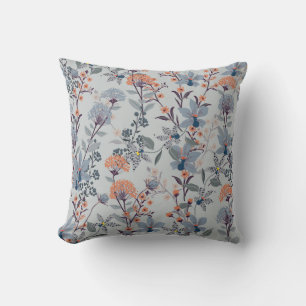 Wild flowers on blue, botanical pattern. throw pillow