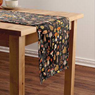 Wild mushrooms on black short table runner