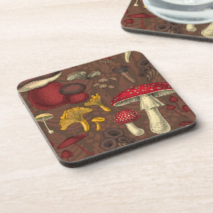 Wild mushrooms on brown coaster