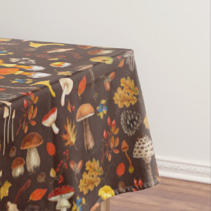 Wild mushrooms on brown tablecloth