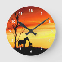 Wild Mustang Mare and Foal Silhouette With Sunset
