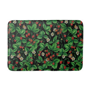 Wild strawberries on black bath mat