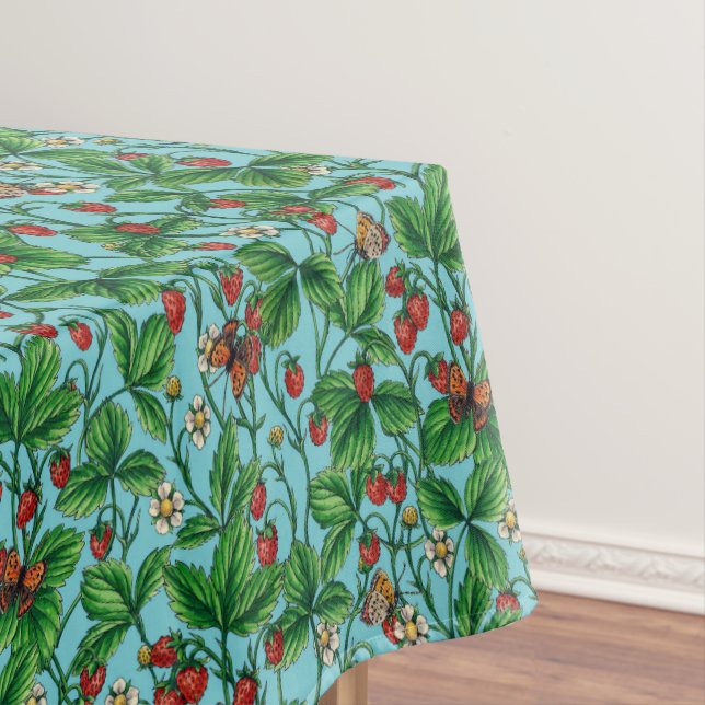 Wild strawberries on pool blue tablecloth (In Situ)