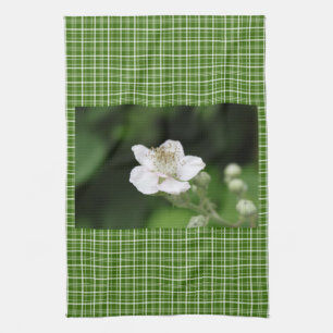 Wild white raspberry flower. kitchen towel