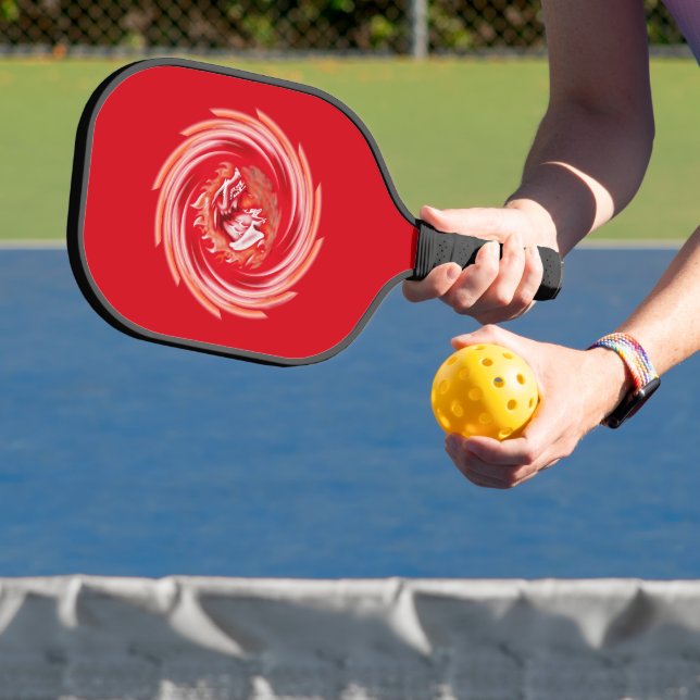 Wild Wolf Whirling red pickleball paddle carbon (Insitu)