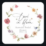 Wildflower Bloom Bridal Shower Square Sticker<br><div class="desc">Love in Bloom in elegant script with event name and date framed by watercolor wildflowers Coordinates with the In Bloom Bridal Shower Collection
 found in the Adore Paper Co. Zazzle Shop.</div>