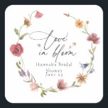 Wildflower Bloom Bridal Shower Square Sticker<br><div class="desc">Love in Bloom in elegant script with event name and date framed by watercolor wildflowers Coordinates with the In Bloom Bridal Shower Collection
 found in the Adore Paper Co. Zazzle Shop.</div>