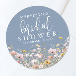 Wildflower Dusty Blue Bridal Shower Classic Round Sticker<br><div class="desc">Name’s Bridal Shower Round Sticker. Perfect for spring through autumn celebrations, this design features a dusty blue or periwinkle blue background for a soft, romantic, and timeless look, ideal for envelope seals or thank-you favour gifts. Along the bottom edge, a row of colourful pastel watercolor wildflowers adds a fresh, floral...</div>