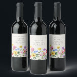 Wildflower Rustic Chic Floral Boho Country Wedding Wine Label<br><div class="desc">Celebrate your love story with this elegant floral wedding wine label featuring a charming watercolor wild flower design and modern calligraphy script. Perfect for a garden wedding, outdoor ceremony, or rustic boho celebration, this design blends whimsical floral elements with timeless elegance. Ideal for summer or spring weddings, the vibrant botanical...</div>