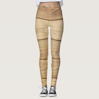 Wildflowers, herbs: wooden background. leggings