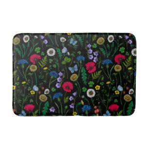 Wildflowers on black bath mat