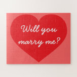 Will You Marry Me? red heart Jigsaw Puzzle<br><div class="desc">This jigsaw puzzle features a shapely red heart overlaid by the template text,  "Will you marry me?" in a white cursive font. Personalize with your girlfriend or boyfriend's name.  Customize font style,  size,  and colour,  as well as the background colour.</div>