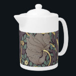 William Morris Pimpernel Vintage Pattern Teapot<br><div class="desc">William Morris Pimpernel Floral Vintage Art Wallpaper Design William Morris was an English textile designer, artist, writer, and socialist associated with the Pre-Raphaelite Brotherhood and British Arts and Crafts Movement. He founded a design firm in partnership with the artist Edward Burne-Jones, and the poet and artist Dante Gabriel Rossetti. This...</div>