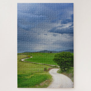 Winding road under a dark sky jigsaw puzzle