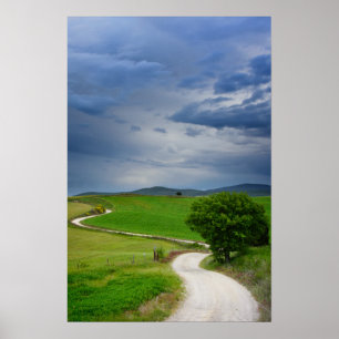 Winding road under a dark sky poster