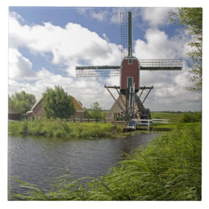 Windmill along a canal east of Leiden in the Tile
