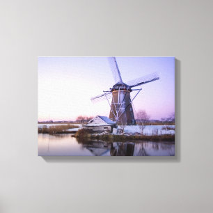 Windmill during sunrise, Holland in winter canvas