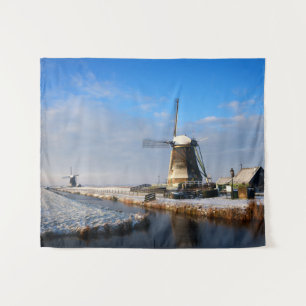 Windmill in the snow in a dutch winter landscape tapestry