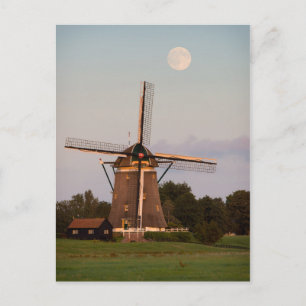 Windmill under a full moon postcard
