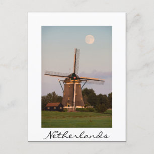 Windmill under a full moon white postcard