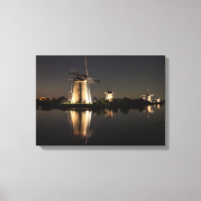 Windmills illuminated at night canvas print (Front)
