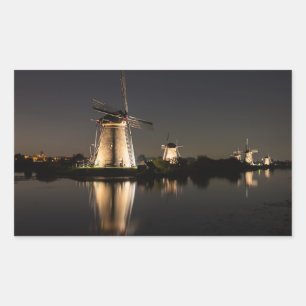 Windmills illuminated at night sticker