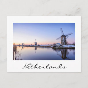 Windmills in winter in Holland white text postcard