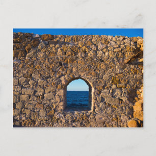 Window on a Stone Wall to the Aegean Sea Postcard