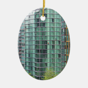 Window washers on downtown high rise building ceramic ornament