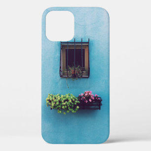 WINDOW WITH FRAME ABOVE GREEN AND PINK PETALED FLO iPhone 12 CASE