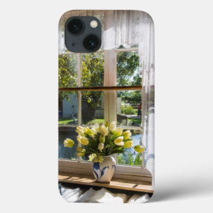 Window with lace curtain and tulips iPhone 13 case