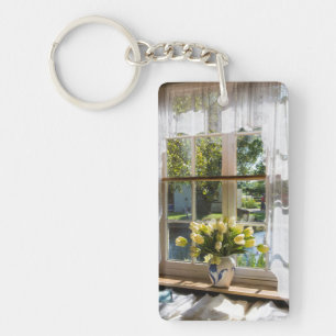 Window with lace curtain and tulips keychain