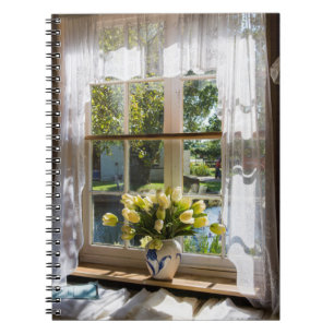 Window with lace curtain and tulips notebook