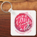 Wine A Little Keychain<br><div class="desc">Round keychain features fun text "Wine a Little Laugh A Lot" on a red wine stain - personalized with any information. Keychains make memorable gifts for family and friends or create for yourself.</div>