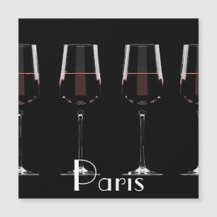 Wine glasses with red wine on black