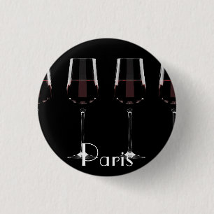 Wine glasses with red wine on black 1 inch round button