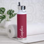 Wine Red Personalized Wedding Bridesmaid Water Bottle<br><div class="desc">Gift your wedding bridesmaid or maid of honour with this trendy, vacuum Insulated water bottle that features her name in white, stylized script on a wine red colour background designed to match your wedding colour scheme. Personalize bottle by editing and replacing name with your own as desired. Select your water...</div>