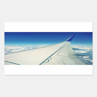 Wing view from airplane during flight sticker