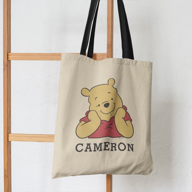 Winnie the Pooh hands on face smiling Tote Bag (Tote bag hanging on ladder)