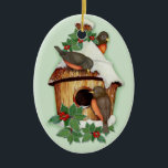 Winter Birds Ceramic Ornament<br><div class="desc">Delightful winter wildlife scene with little birds,  a snow covered birdhouse and holly.  Delightful wildlife Christmas Ornament gift or keepsake.</div>