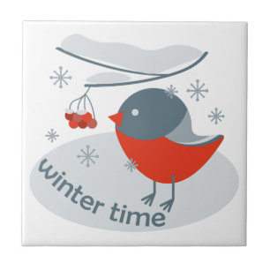 Winter bullfinch bird and red rowan berries   tile