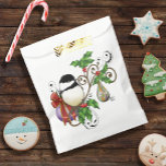 Winter Chickadee Christmas Favour Bag<br><div class="desc">A chickadee perches on a snow-dusted tree branch in this winter illustration.  Christmas holly and the little bird is surrounded by two  holiday ornaments—one round and one teardrop-shaped—both adorned with festive patterns and rich seasonal colours. Snowflakes and snow falling all around in a backdrop of light blue.</div>