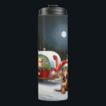 Winter Dachshund Caravan Christmas Adventure  Thermal Tumbler<br><div class="desc">Embrace the magic of a snowy winter night as a caravan glides gracefully through the moonlit landscape. The serene beauty of the glistening snow and the enchanting glow of the moon create a captivating scene,  promising an unforgettable Christmas adventure filled with warmth,  joy,  and cherished memories.</div>