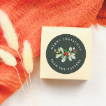 Winter Foliage Green Merry Christmas & Family Name Classic Round Sticker<br><div class="desc">This custom Christmas sticker features a festive green background. In the middle of the design there is a hand-painted botanical arrangement, with lush green leaves and red winter berries. The text forms a circle around the outside of the foliage. At the top of the sticker, "Merry Christmas" is written in...</div>