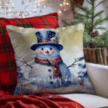 Winter Forest Snowman Christmas | Gold Throw Pillow<br><div class="desc">Bring joy and whimsy to your seasonal decor with this charming Gold Winter Forest Holiday Throw Pillow. Featuring a smiling snowman dressed in a classic top hat and cozy scarf, the design captures the magic of a wintry scene with softly falling snow and delicate white snowflakes. Nestled among frosted trees,...</div>