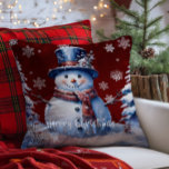 Winter Forest Snowman Christmas | Red Throw Pillow<br><div class="desc">Bring joy and whimsy to your seasonal decor with this charming Red Winter Forest Holiday Throw Pillow. Featuring a smiling snowman dressed in a classic top hat and cozy scarf, the design captures the magic of a wintry scene with softly falling snow and delicate white snowflakes. Nestled among frosted trees,...</div>