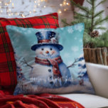 Winter Forest Snowman Christmas | Teal Throw Pillow<br><div class="desc">Bring joy and whimsy to your seasonal decor with this charming Teal Winter Forest Holiday Throw Pillow. Featuring a smiling snowman dressed in a classic top hat and cozy scarf, the design captures the magic of a wintry scene with softly falling snow and delicate white snowflakes. Nestled among frosted trees,...</div>