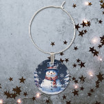 Winter Forest Snowman Christmas Wine Charm<br><div class="desc">Mark your wine glass this holiday season with a Winter Forest Snowman Christmas Holiday Wine Charm.  Wine charm design features a cute snowman in a charming top hat and scarf standing in a winter forest scene with falling snow. Additional gift and holiday items available with this design as well.</div>